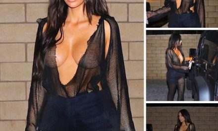 PICTURE EXCLUSIVE: Sheer wonder! Braless Kim Kardashian flashes her ample cleavage in a dangerously low-cut mesh jumpsuit for date night with Kanye