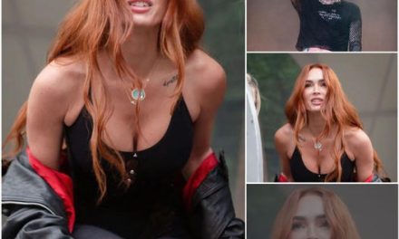 Megan Fox Wears A Plunging Bodysuit Tucked Underneath Lacy Tights To Support Machine Gun Kelly