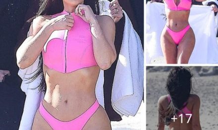 Kim Kardashian flaunts her bare backside in a pink thong bikini during a rare behind-the-scenes glimpse of Skims photoshoot