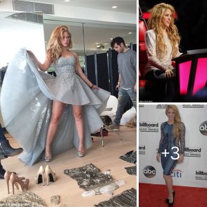 So many shoes, so little time! Shakira is surrounded by pairs of sparkly high heels as she tries on glamorous silver grey gown