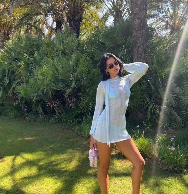 Joanne Kavanagh reports: Dua Lipa dazzles in a mesmerizing baby blue sheer dress during her vacation in Ibiza