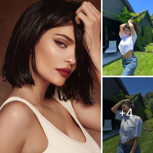 Kylie Jenner shows off tiny waist in white crop top as her shrinking frame drowns in baggy jeans for new pics