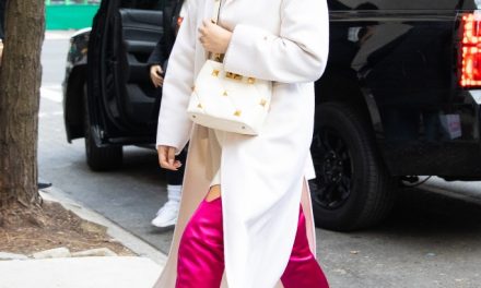 Chrissy Teigen Looks Like a Winter Barbie Doll in Timeless White Coat and the Most Electrifying Pink Boots